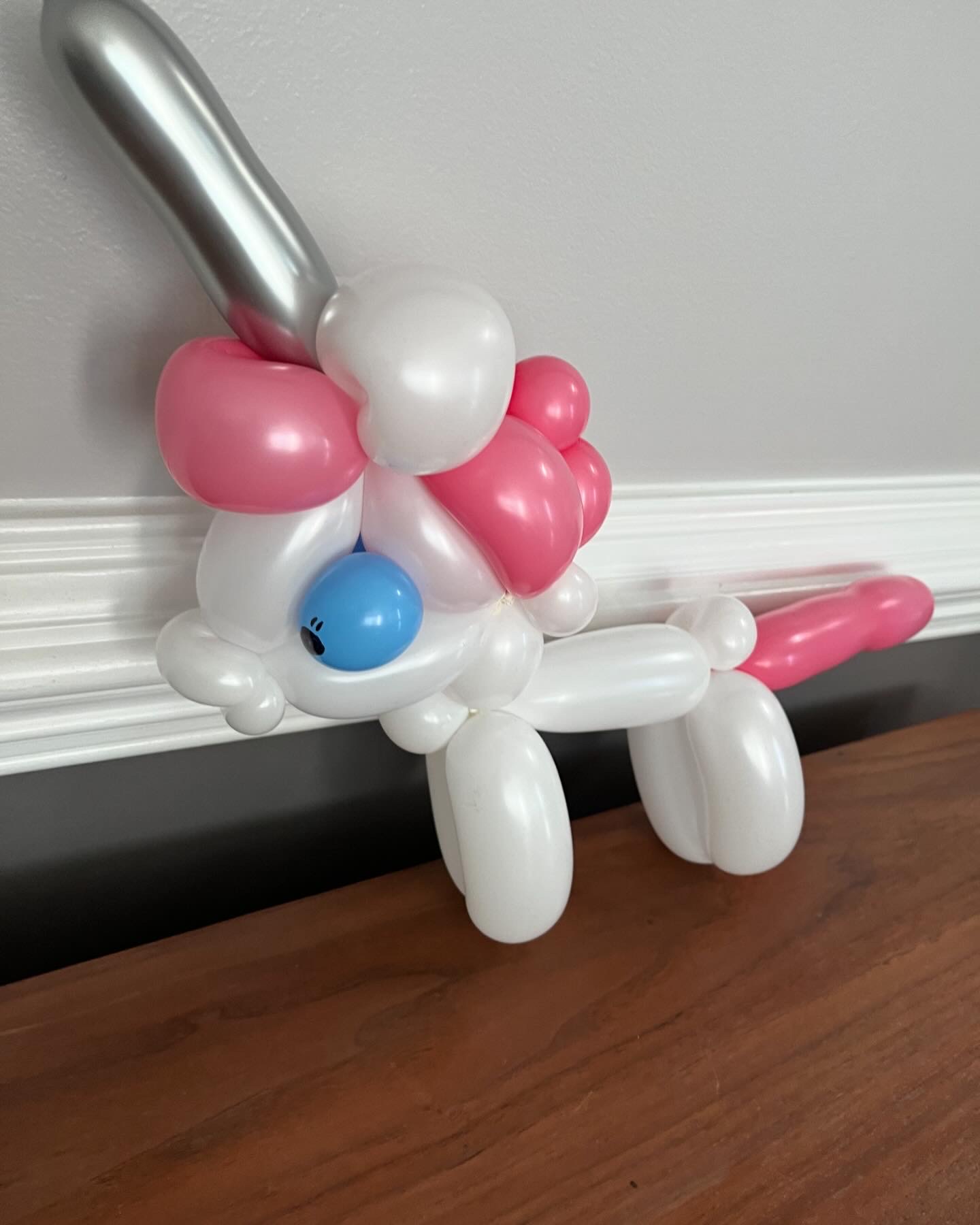 White and pink balloon unicorn with silver horn